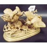 Good ormolu model after Ferdinand Pautrot (1832-1874) depicting two birds upon a naturalistic oval