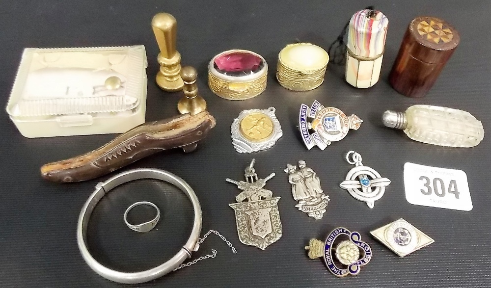 Miscellaneous small items including two brass seals, a child's silver bangle, an enamelled metal