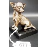 A bronze model of a seated Chihuahua dog, height 3'