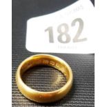 22ct gold wedding band, weight 6.9g approx.