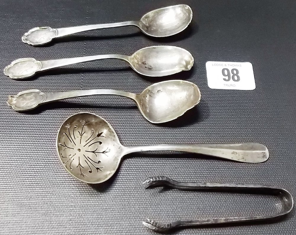 George IV silver sifter spoon, together with a pair of silver sugar tongs and three scrap silver