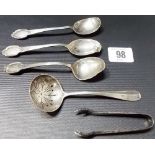 George IV silver sifter spoon, together with a pair of silver sugar tongs and three scrap silver