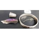 A Charles Horner silver thimble; together with an Edwardian silver slipper pin cushion and a