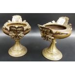 Pair of 19th Century French bronze pedestal incense burners, the twin handles cast as the head of