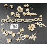 A collection of seed pearl on mother of pearl jewellery, some in need of reassembly, pair of