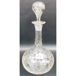 19th Century decanter and stopper, the neck facet cut, the stopper and body with fern wheel engraved