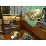 Early 20th Century brass desk light with scallop shell moulded chaise and flexible stem, height 32'