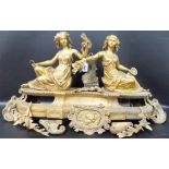 Good 19th Century ormolu centrepiece for a timepiece, modelled with two opposing reclining