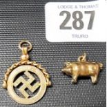 9ct gold swivel fob, together with a 9ct gold pig charm, weight 4.3g approx.