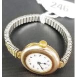 Early 20th Century 9ct gold manual wind wrist watch, the white dial with Arabic numerals, upon