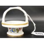 A 19th Century Nantgarw style miniature cream pail, the sides foliate spray painted and with gilt