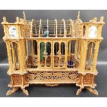 Interesting pierced wood birdcage, width 18'.