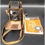 A Rolleicord camera with Carl Zeiss Jena 75mm lens within fitted brown leather box and original