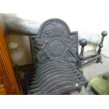 20th Century cast iron 17th Century style fire back decorated with a Royal Coat of Arms, together