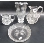 Four pieces of glass including a Victorian jug with etched decoration, circular cut dish, cream
