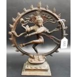 Indian votive bronze modelled as dancing Shiva Nataraja standing on elliptical pedestal, height 9'