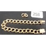 Yellow metal curb link bracelet with two extra links, weight 31g approx
