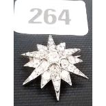 Victorian/Edwardian white gold diamond set star brooch pendant, the central diamond of 0.20ct spread