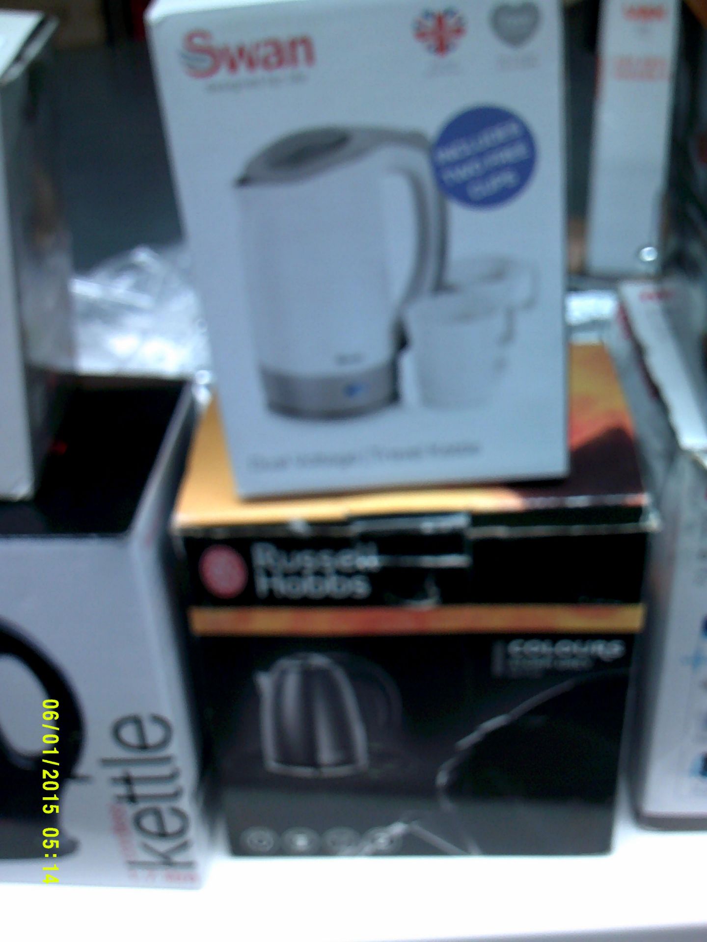 Swan Dual Voltage Travel Kettle with 2 Cups and Russel Hobbs Storm Grey Kettle Customer Returns
