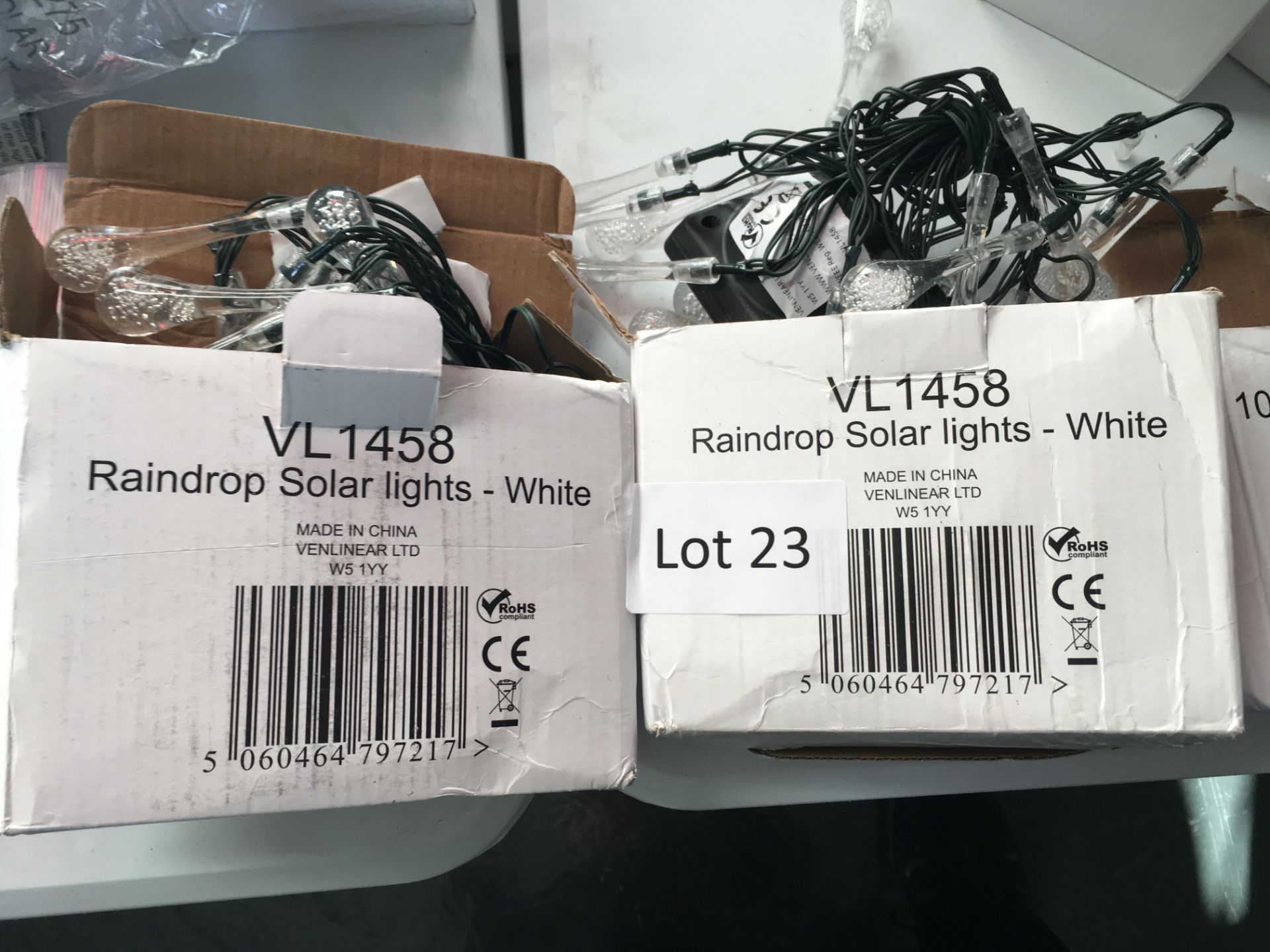 2 x raindrop solar lights. Bad packaging.