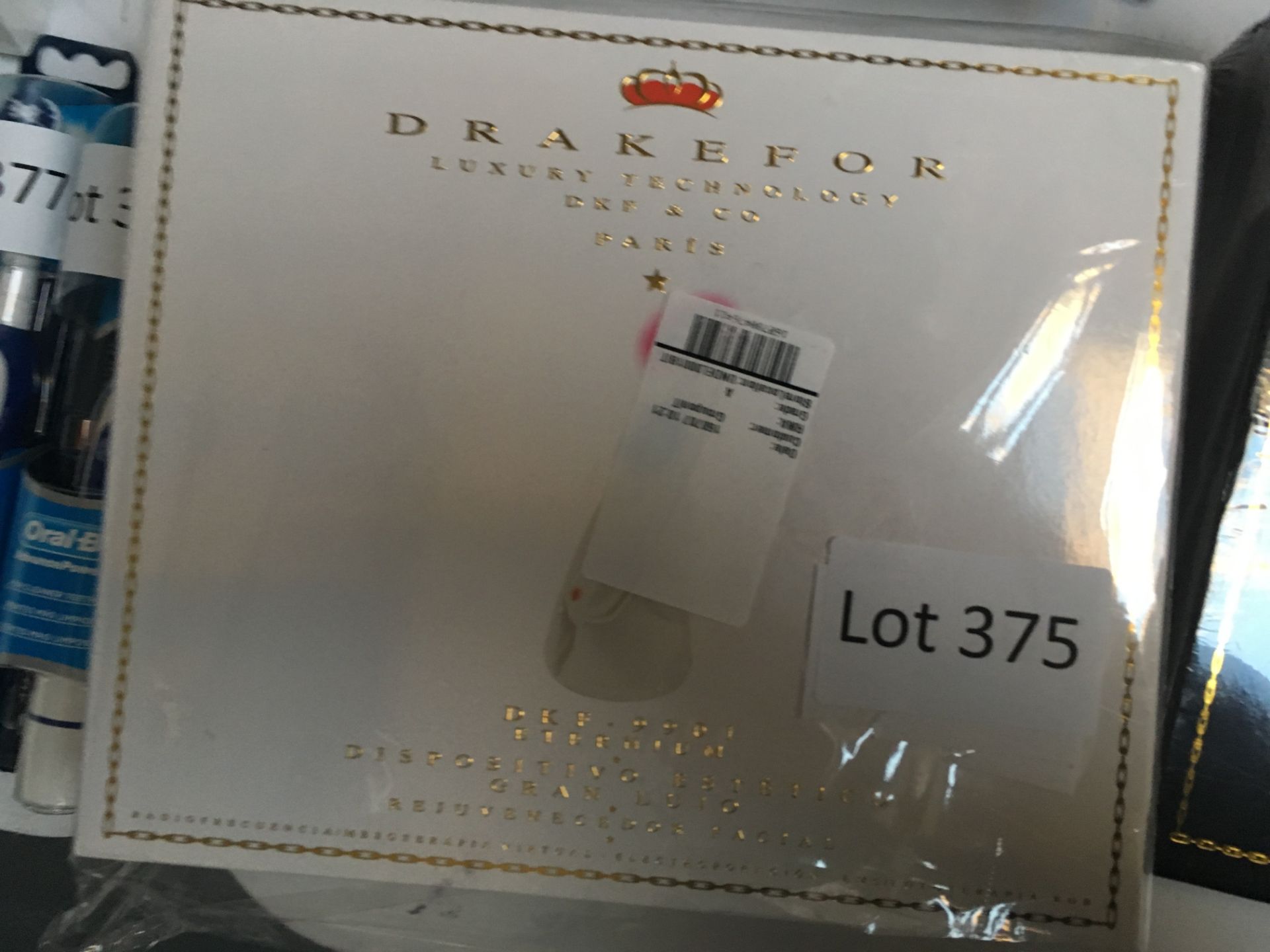 Drakefor 9901 rejuvenating facial lazer device. New in packaging.