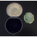 A jade court jewlery in the shape of a flower pot 玉珮件