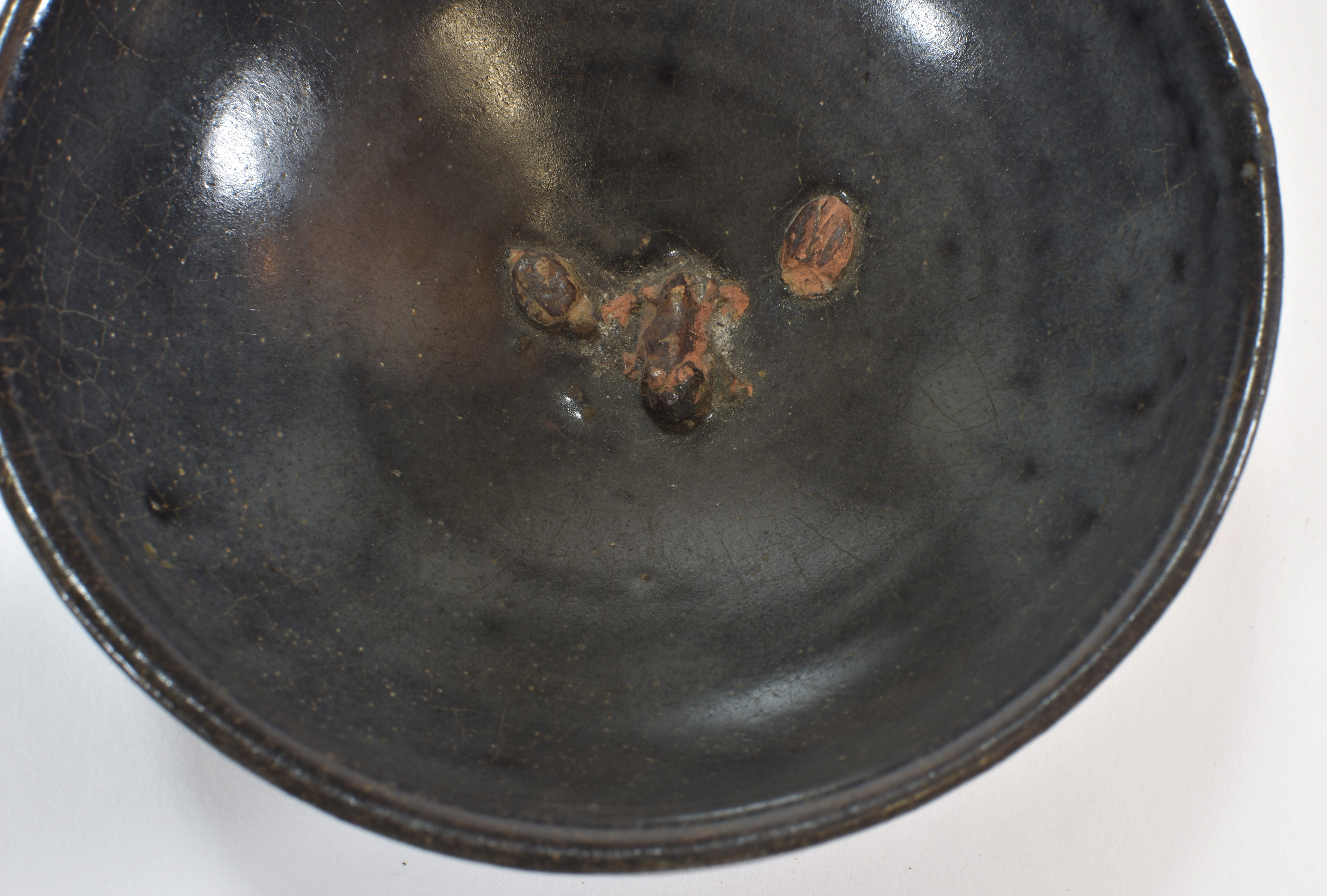 A Song dynasty black glazed tea bowl with a frog feature inside 11cm diameter宋朝時期 黑釉碗 - Image 3 of 3