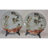 A pair o f Japanese Imari dishes decorated with flying cranes bearing old label of Liberty 28cm