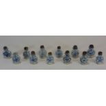 Twelve blue and white medicine bottles (one missing a lid) 青花藥瓶十二件