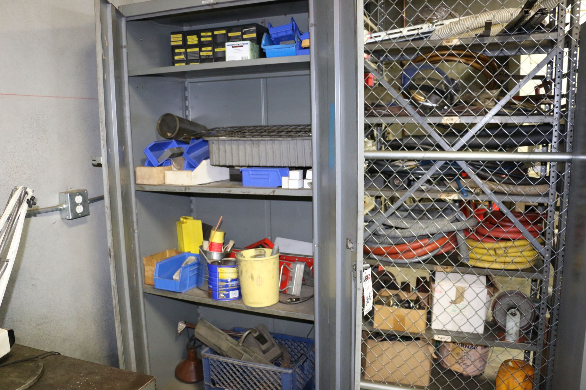 Large Metal Storage Cabinets with Misc Content