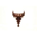 A Small Mahogany Wall Bracket