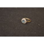 A 9ct Gold Blue Topaz and Diamond Ring