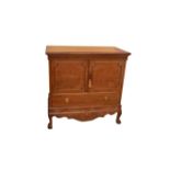 A Carved Mahogany Two Door Side Cabinet on Base