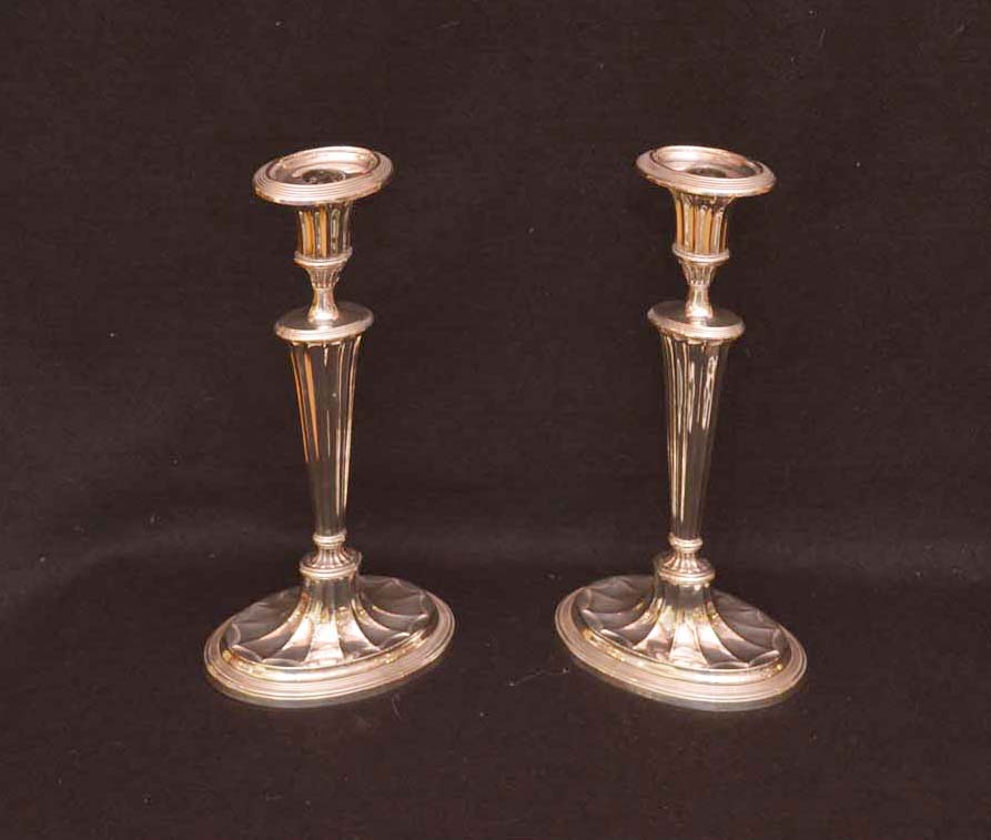 A Pair of Matched Silver Plated Candle Sticks