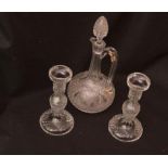 A Crystal Decanter and a Pair of Crystal Candlesticks