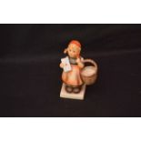 A Hummel Figurine ‘Girl with Letter and Basket’