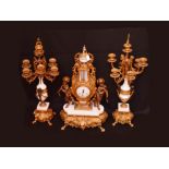 A Three Piece Gilted Metal and Marble Clock Set