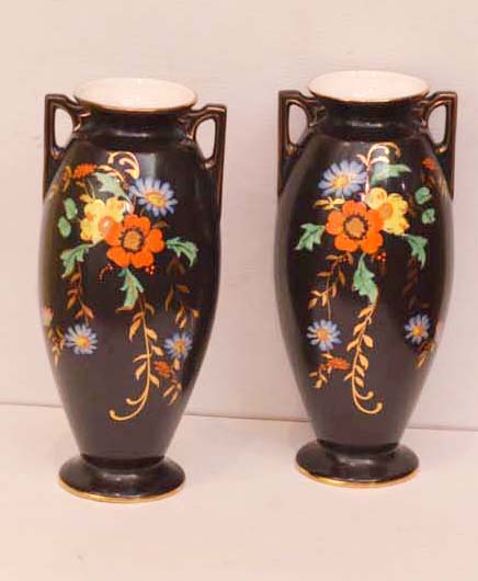 A Nice Pair of Decorative Two Handled Vases