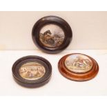 A Set of Three Framed Pot Lids