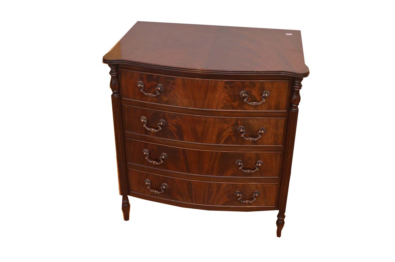 A Fine Mahogany Shaped Front Four Drawer Chest