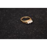 A Nice 18ct Gold Three Diamond Ring