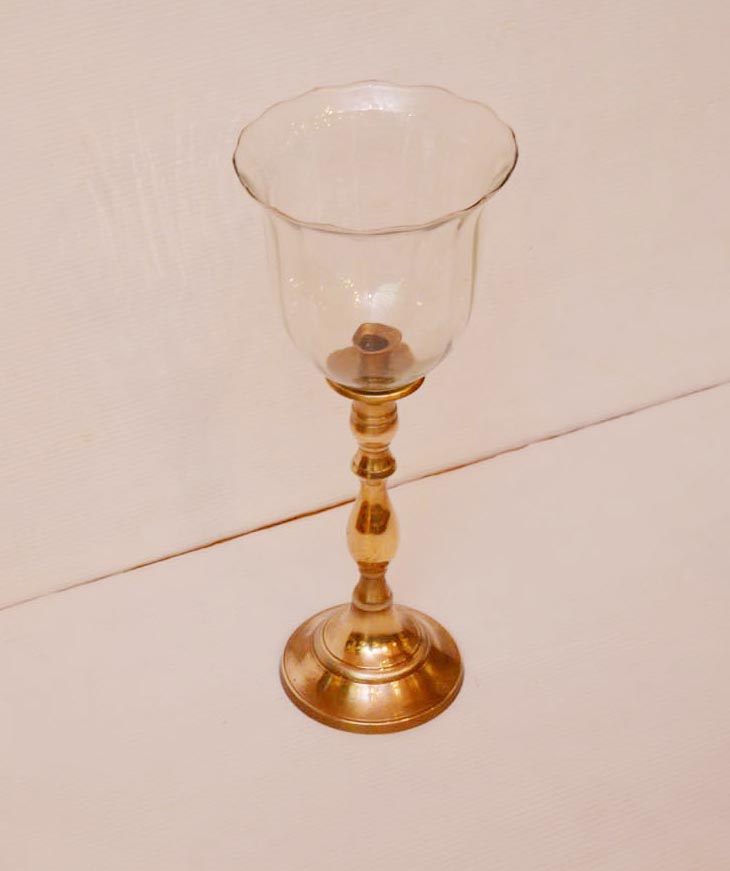 A Brass Based Candle Holder