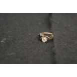 A Superb Sapphire and Diamond Two Stone Twist Ring, Diamond approx 0.6ct