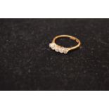 An 18ct Gold and Five Diamond Ring
