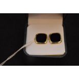 A Pair of 9ct Gold & Oynx Cufflinks