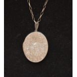 A Large Silver Locket and Chain