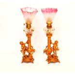 A Very Nice Pair of Cherub Based Peg Lamps, Hand Painted Bowls and Painted Shades