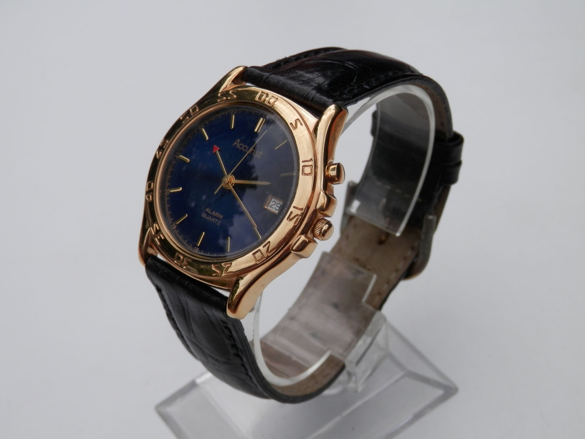 FULLY WORKING 1990S ACCURIST GENTS GOLD PLATED ANALOGUE ALARM QUARTZ WATCH, METALLIC BLUE DIAL.