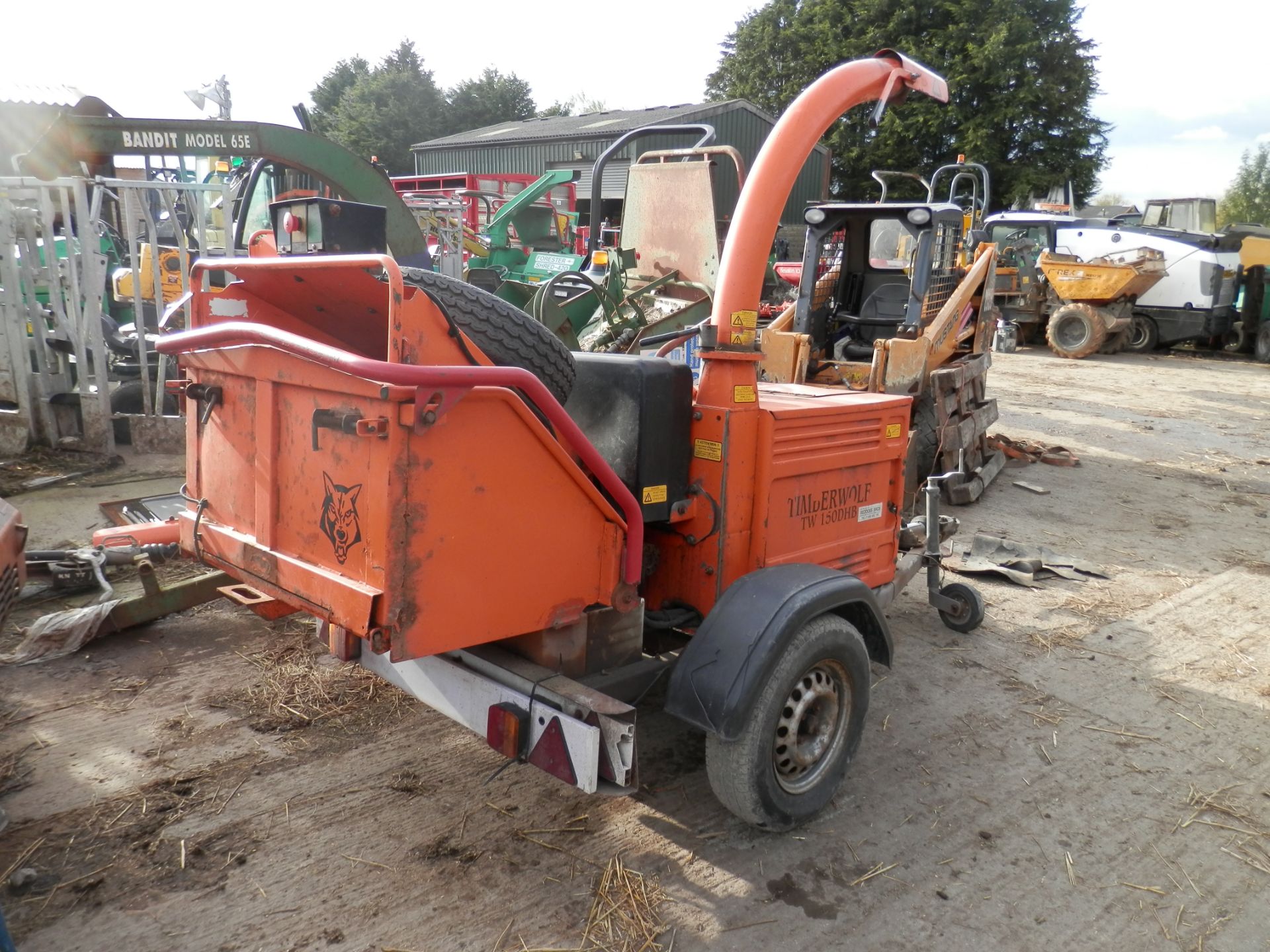 2007 WORKING TIMBERWOLF DIESEL CHIPPER & TRAILER.