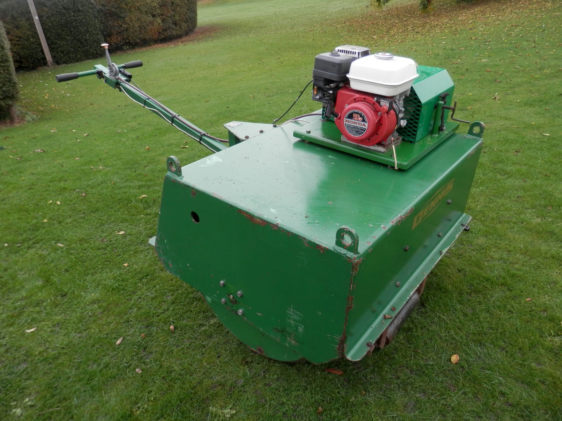 LARGE 1990S DENNIS LAWN ROLLER WITH HONDA 5 HP PETROL ENGINE.